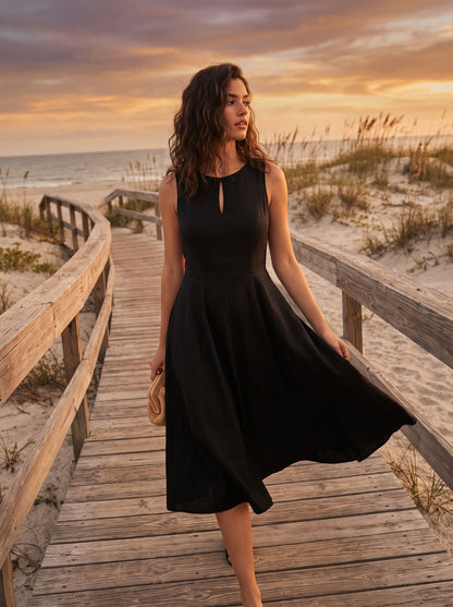 Black keyhole cocktail midi dress by Riley Belle