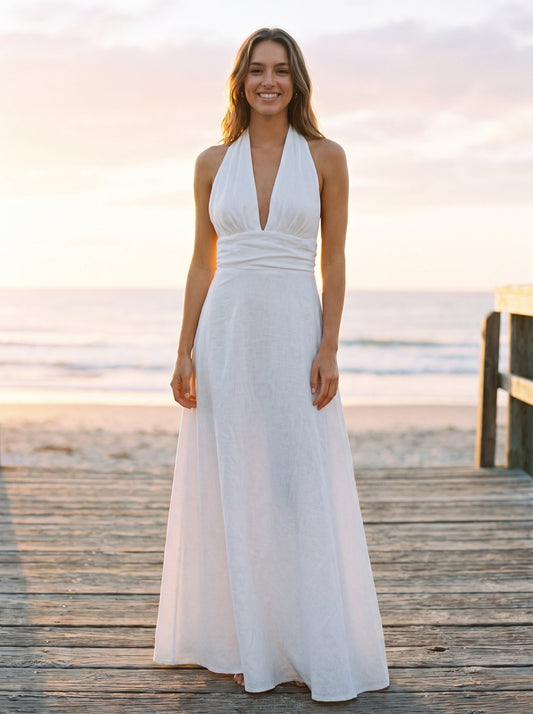 White plunge halter maxi dress by Riley Belle