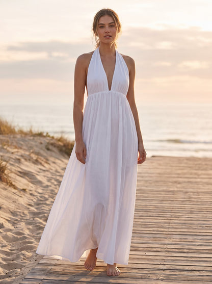 White plunge halter maxi dress by Riley Belle