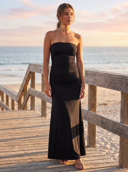 Black strapless ruched maxi dress by Riley Belle