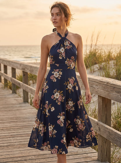 Navy floral halter wedding guest midi dress by Riley Belle