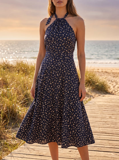 Navy floral halter wedding guest midi dress by Riley Belle