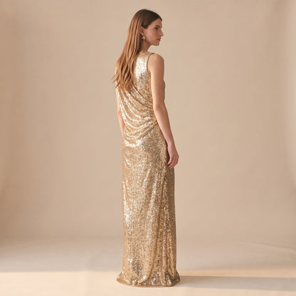 Celia gold sequin maxi dress side view by Riley Belle