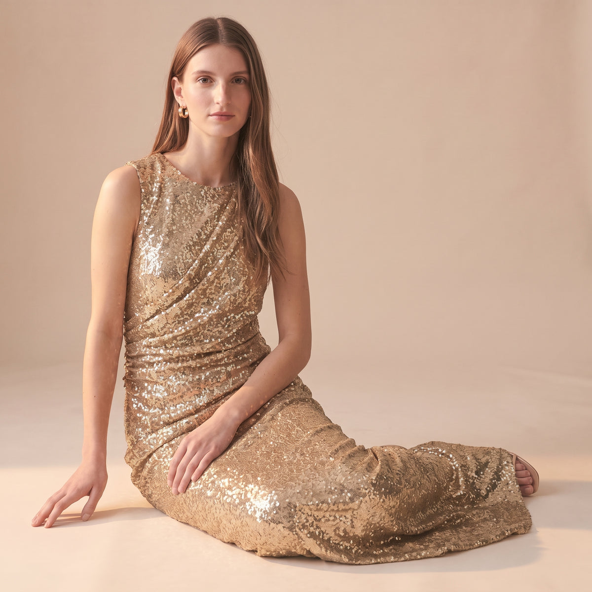 Celia gold sequin maxi dress back view by Riley Belle