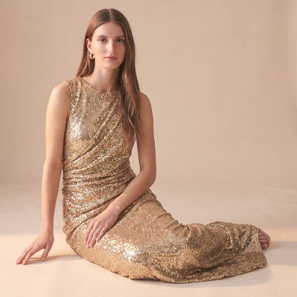 Celia gold sequin maxi dress back view by Riley Belle