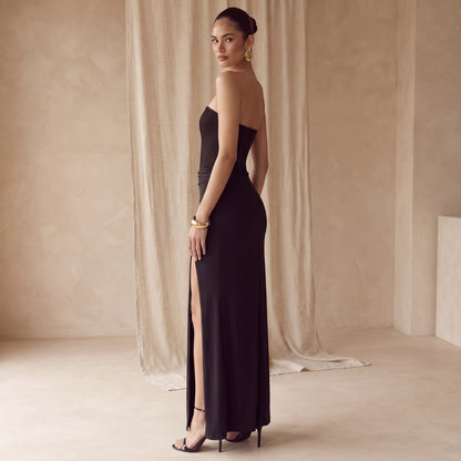 Anouk black corset high-split maxi dress side view by Riley Belle
