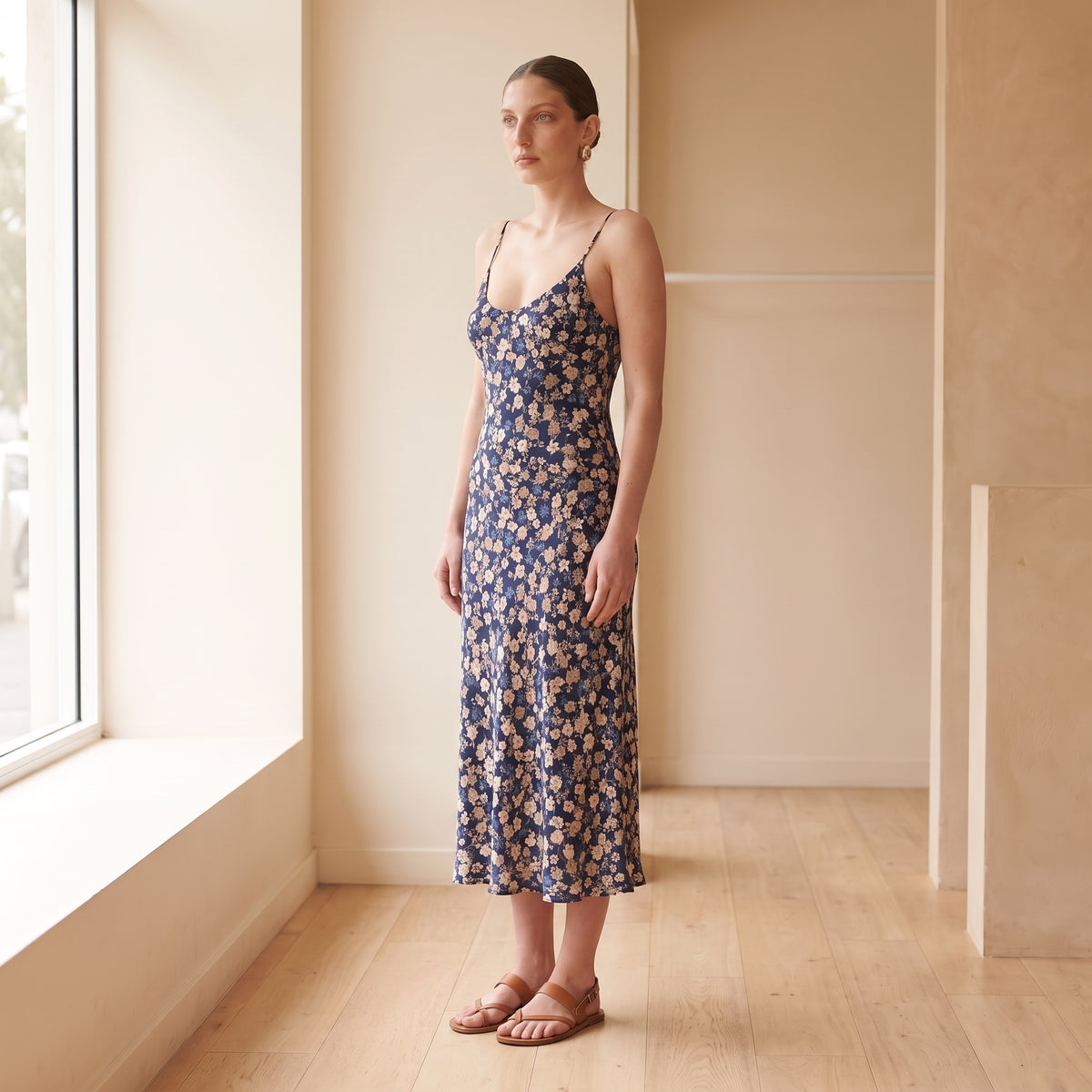 Celeste navy floral slip midi dress side view by Riley Belle